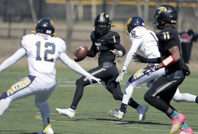 Grayslake North's Jacob Donohue (1) looks for an open reciever during football Saturday March 20, 2021 in Grayslake.