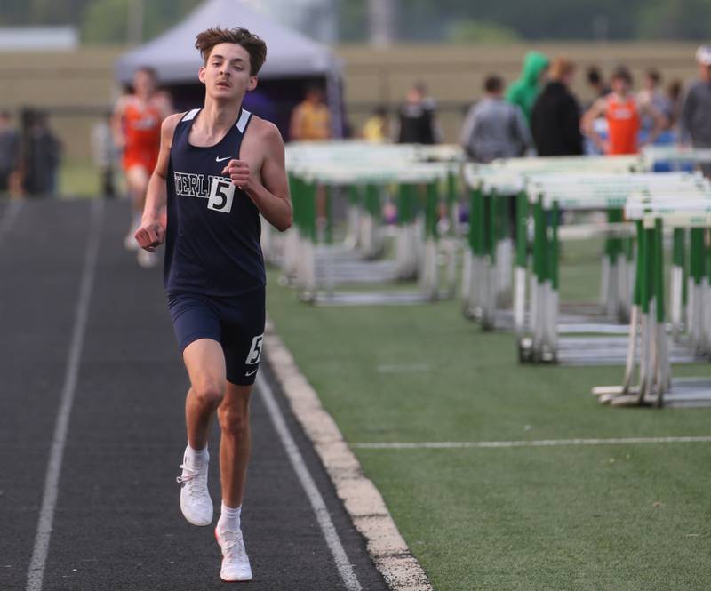 Sterling's Aalin Schmidt competes in the 3200 meter run during the Class 2A track sectional meet on Wednesday, May 17, 2023 at Geneseo High School.