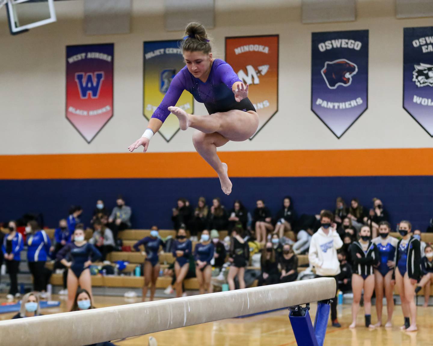 Downers Grove South's Emily Smetana performs on the balance beam during Oswego Gymnastics Regional. Feb 7, 2022.