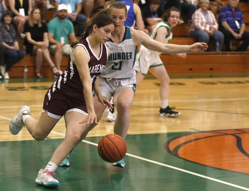 Marengo’s Keatyn Velasquez brings the ball up the court against Woodstock North's Isabella Borta during the girl’s game of McHenry County Area All-Star Basketball Extravaganza on Sunday, April 14, 2024, at Alden-Hebron’s Tigard Gymnasium in Hebron.