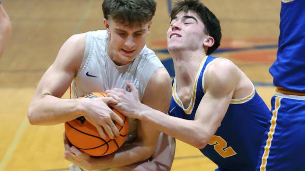 Photos: Genoa-Kingston, ACC match up in Class 2A boys basketball regional quarterfinal