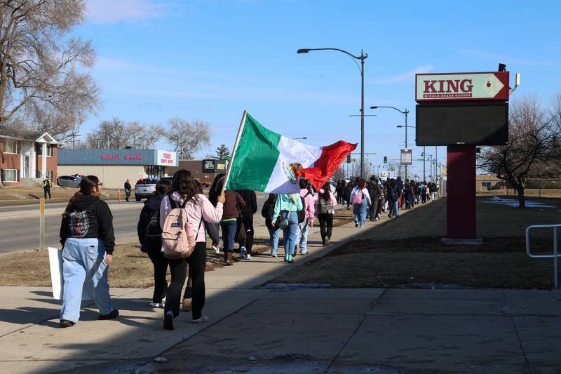 Kankakee High School students pass by King Middle School as they participate in a walkout in protest of national immigration policies and Immigration and Customs Enforcement actions on Friday, Feb. 13, 2026.