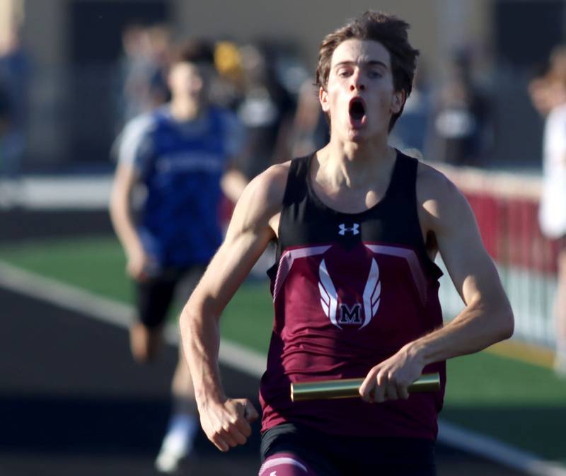 Marengo’s Jackson Heimsoth reacts as he crosses the finish line with a win in the 800-meter relay in KRC Conference Track Meet action at Richmond-Burton High School in Richmond on Tuesday, May 13, 2025.