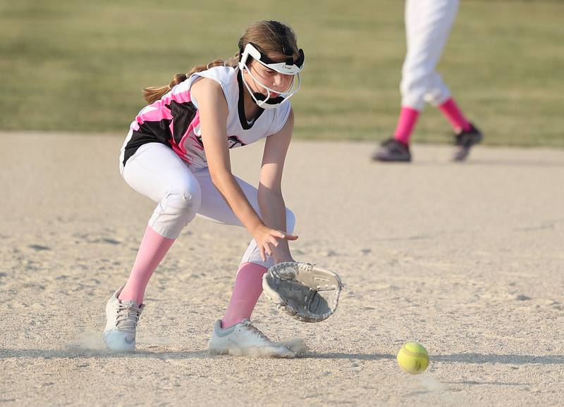 Kishwaukee Valley Storm 10u player Fiona Morris fields a ground ball Wednesday, June 21, 2023, during a scrimmage game against the Poplar Grove Power at the Sycamore Community Sports Complex. The Kishwaukee Valley Storm is hosting the Storm Dayz tournament this weekend which draws about 70 teams and runs Friday through Sunday in Sycamore.