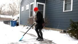 Photos: Snow cleanup and freezing temperatures in Downers Grove