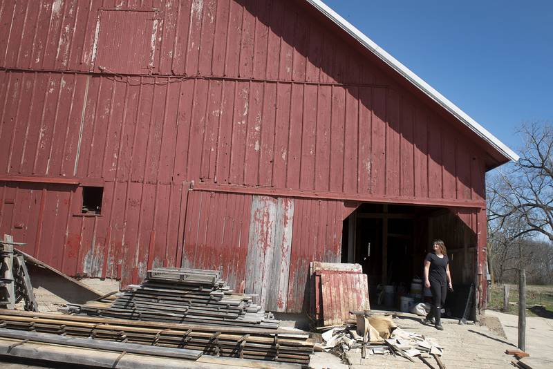 Agritourist Michelle Erickson checks out the 1950’s barn on the property. The barn is undergoing a renovation with expectations that it will be used as an event center.