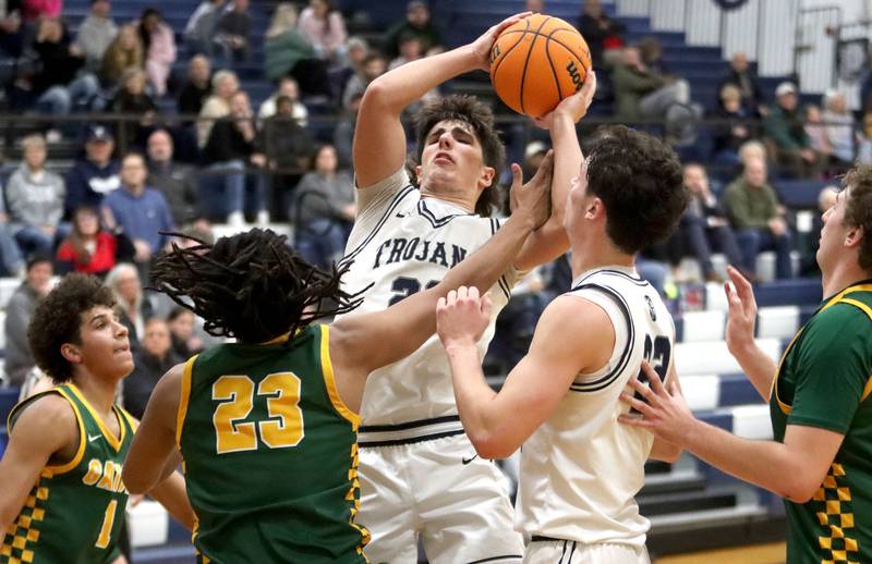 Cary-Grove’s Brady Elbert snags a rebound against Crystal Lake South in varsity boys basketball on Wednesday, Dec. 3, 2025, at Cary-Grove High School in Cary.