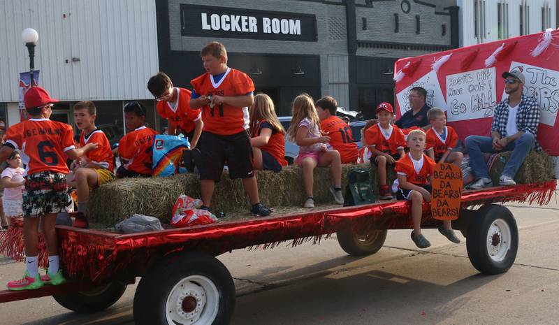 The Bears flag football team rides during the Homecoming parade on Thursday, Sept. 18, 2025 downtown Spring Valley.