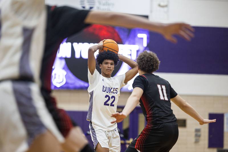 Dixon’s Xavion Jones looks to pass against Stillman Valley Friday, Jan. 9, 2026.