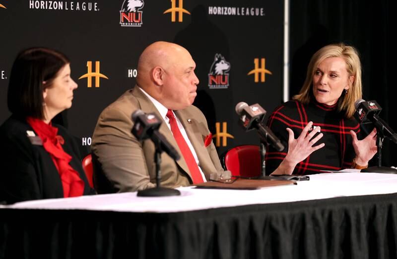 Horizon League Commissioner Julie Roe Lach (right) addresses Northern Illinois University President Lisa Freeman and Sean Frazier, NIU vice president and director of athletics and recreation, during a press conference Thursday, Feb. 27, 2025, at the Convocation Center to announce that NIU will be joining the Horizon League starting with the fall 2026 season for most sports other than football.