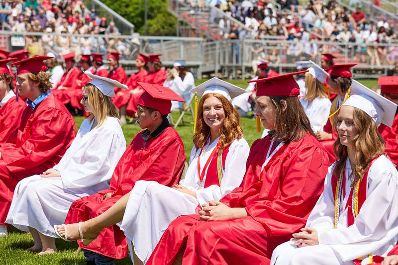 Hall senior Jennifer Casford  smiles during the graduation ceremony on Sunday May 21, 2023 at Hall Township High School.