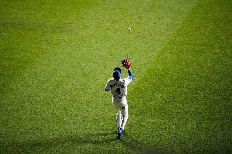 Chicago Cubs' Pete Crow-Armstrong catches the final out in Game 3 of a National League wild card baseball game against the San Diego Padres Thursday, Oct. 2, 2025, in Chicago. (AP Photo/Erin Hooley)