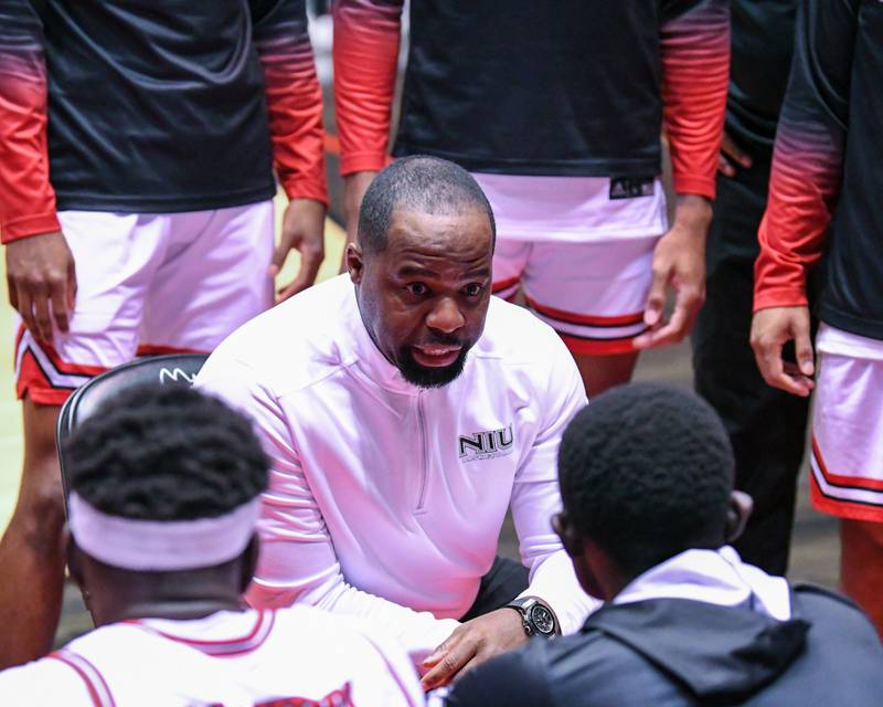 NIU head coach Rashon Burno talks to the team before the start of Tuesday’s Dec. 1st game as they took on Eastern Illinois