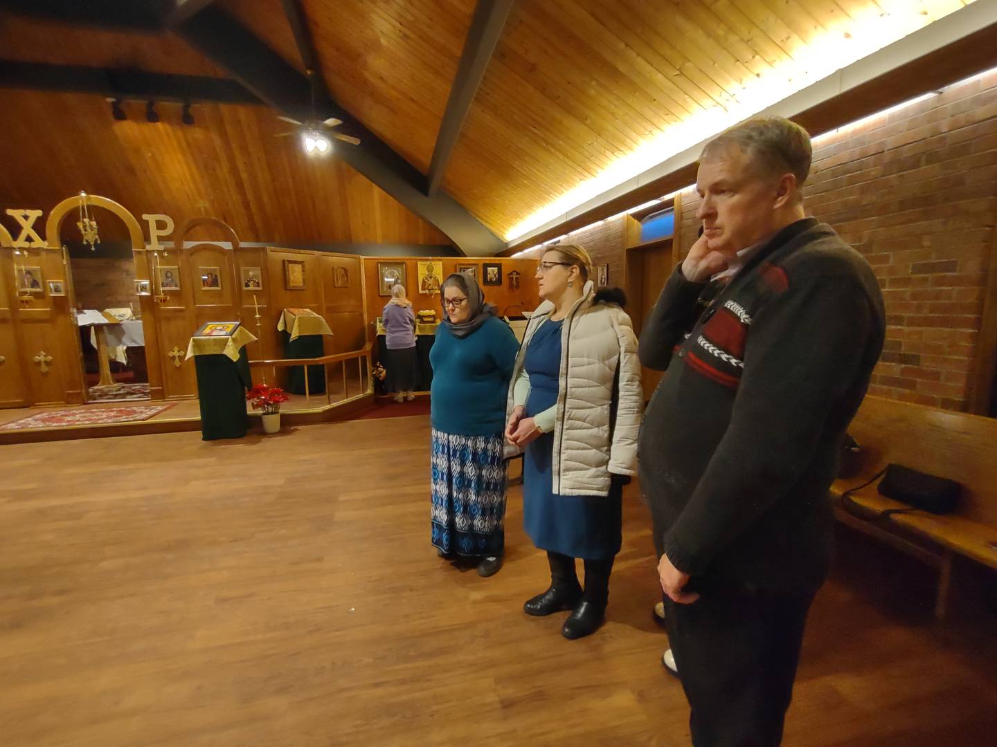 Parishioners at St. Nicholas of Myra Russian Orthodox Church in McHenry, many of whom were born in Ukraine, prayed for peace during service Thursday, Feb. 24, 2022.