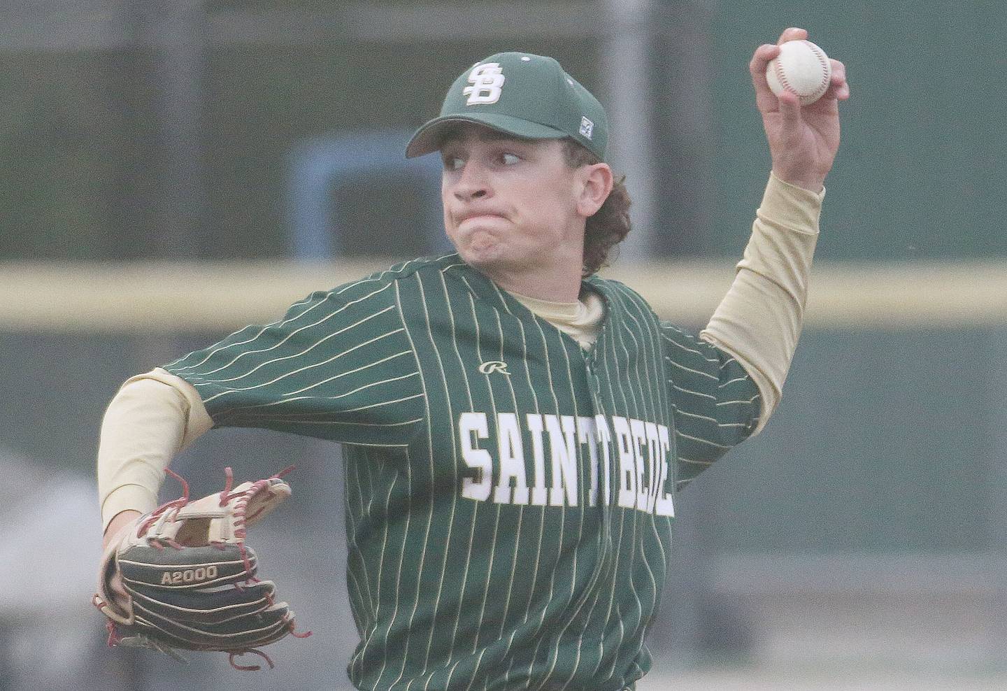 St. Bede pitcher Gino Ferrari fires a pitch to Marquette at Masinelli Field on Thursday, April 18, 2024 in Ottawa.