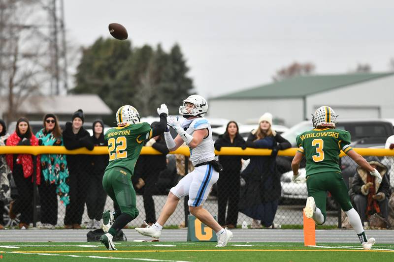 DePaul's Matthew Osterman catches a touchdown pass as Coal City's Noah Houston looks to defend on Saturday, Nov. 23, 2024, during the Rams' 21-14 victory over Coal City in the IHSA Class 4A Playoffs semifinal game.