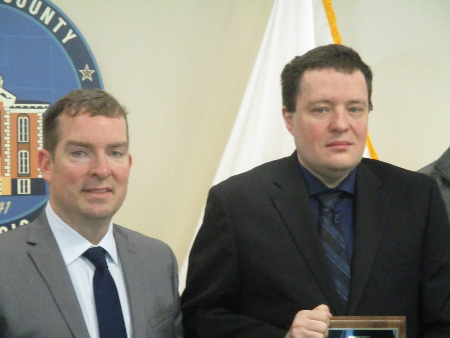 Illinois Attorney General's Office digital forensics expert Steve Strahm, right, is shown here with Kendall County Board Chairman Scott Gryder. (Mark Foster -- mfoster@shawmedia.com)