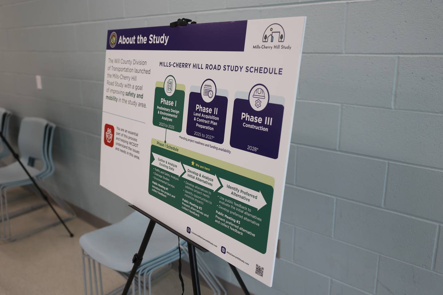 A display details the three phase road improvements along Mills Road and Cherry Hill Road during an open house on the Mill-Cherry Hill Road Study at the Nowell Park Recreation Center in Joliet on Tuesday, July 30, 2024.
