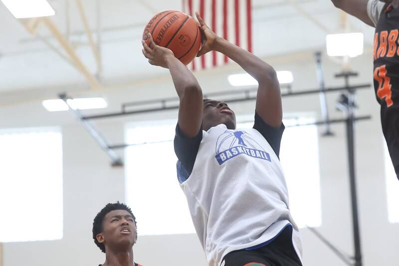 Joliet Central’s Jaylin Adams puts up a shot against DeKalb at the 37th Morris Boys Shootout on Tuesday, June 25, 2024.