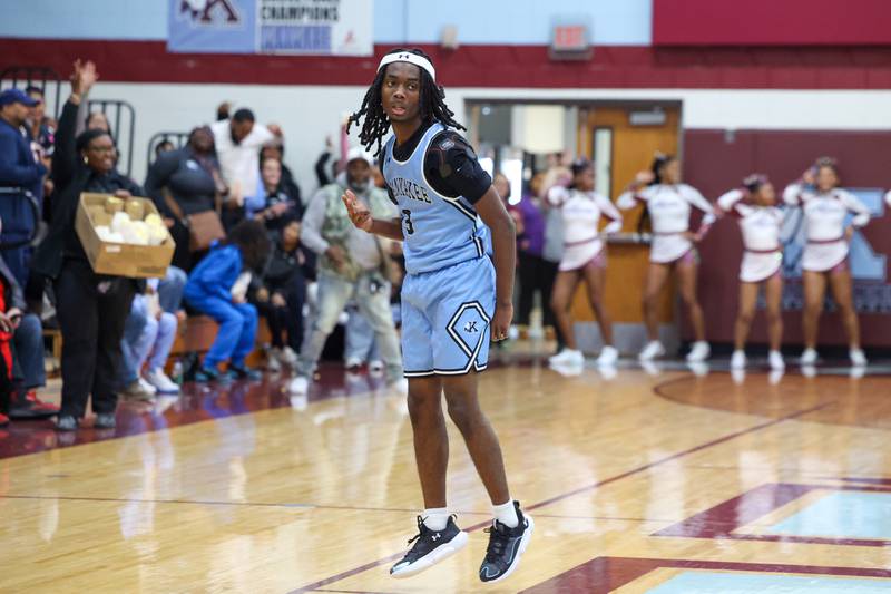 Kankakee's Cedric Terrell III celebrates scoring a 3-pointer to help the Kays take the lead in the fourth quarter during the Kays' 54-50 victory over Lincoln-Way Central in the 75th Kankakee Holiday Tournament maroon bracket championship on Sunday, Dec. 28, 2025.