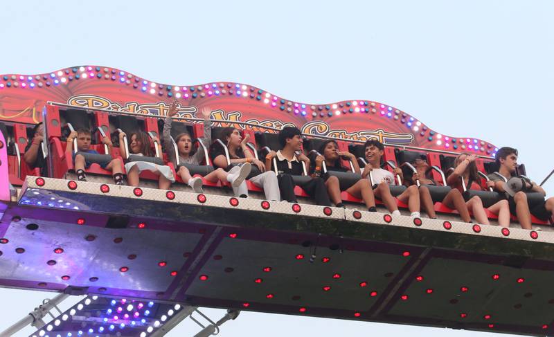 People ride the Magic Carpet carnival ride during the Oglesby Summer Fun Fest on Thursday, June 15, 2023 in Oglesby.