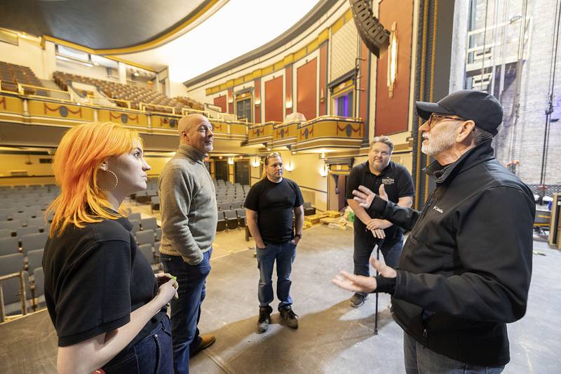 Historian Tom Wadsworth (right) speaks with the staff behind running and maintaining The Dixon Tuesday, Feb. 18, 2025.