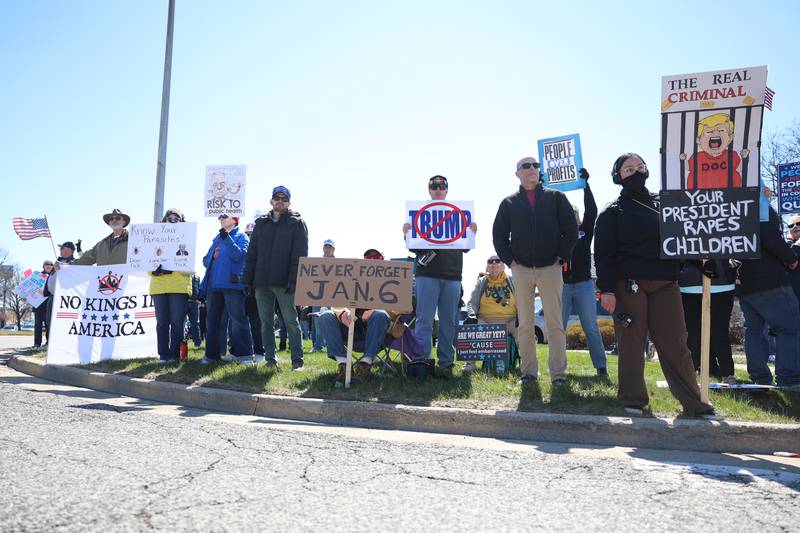 People line Plainfield Road in protest at the No Kings rally on Saturday, March 28, 2026 in Joliet.
