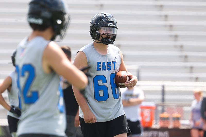 Lincoln-Way East center Josh Janowski walks back to the huddle during a 7-on-7 scrimmage at Lincoln-Way East on Tuesday, July 18th, 2023 in Frankfort.