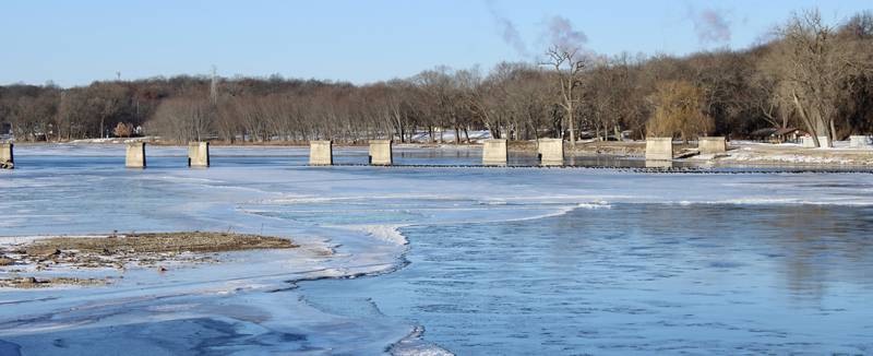 Surface ice forms on the Rock River west of the Peoria Avenue bridge in Dixon on Thursday.