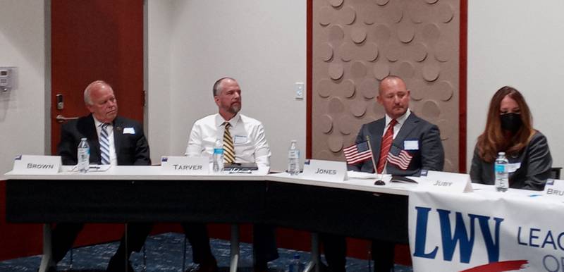 Brown (left) and Democrat William Tarver are vying to represent Kane County District 10 in the Nov. 8 general election. Democrat Leslie Juby and Republican Brian Jones, are vying to represent District 11. A dozen candidates answered questions Sept. 27 at a League of Women Voters of Central Kane County forum.