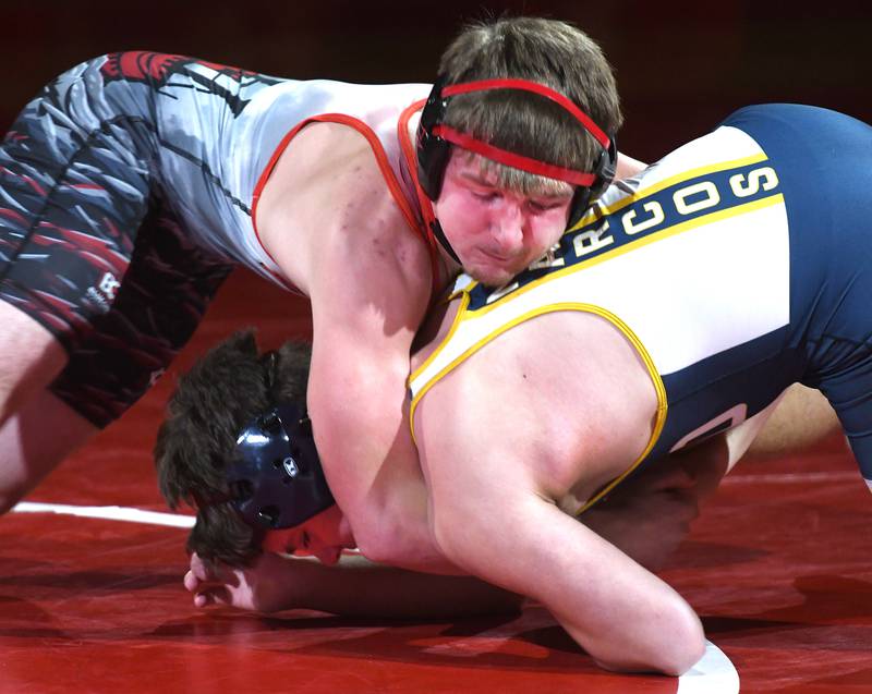 Fulton's Wiley Blasdell (top) holds Polo's Maddux Busker in their 165 pound match at Oregon High School on Thursday, Dec. 4, 2025.