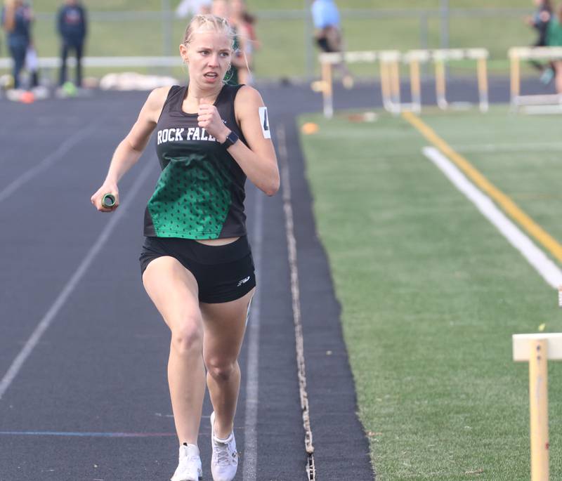 Rock Falls's Kat Scott races to the finish line after winning the 4x800 relay during the Class 2A Sectional track meet on Wednesday, May 13, 2026 in the Jeff Prusator Athletic Complex at Mendota High School.