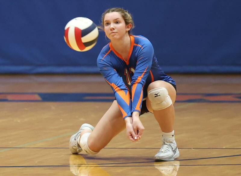 Genoa-Kingston's Ava Hardy tries to get the ball past DeKalb's Isabelle Smith Wednesday, Sept. 11, 2024, during their game at Genoa-Kingston High School.