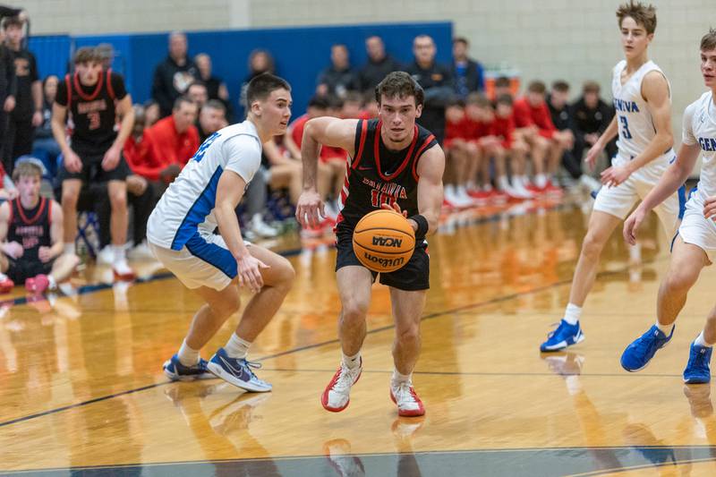 Batavia's Joseph Reid drives to the basket against Geneva on Friday, Dec.19,2025 in Geneva.