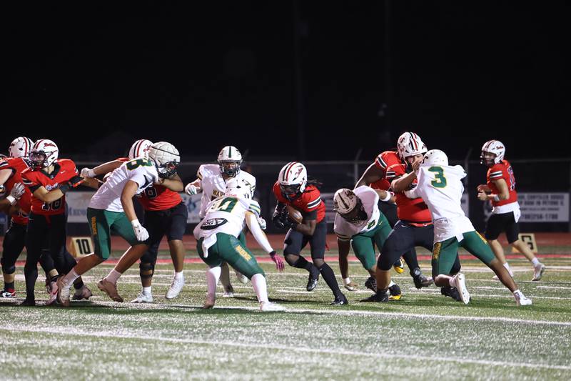 Bradley-Bourbonnais' Kyren Edmon, center, runs the ball during the Boilermakers' 35-6 victory over Waubonsie Valley Friday, Sept. 12, 2025.