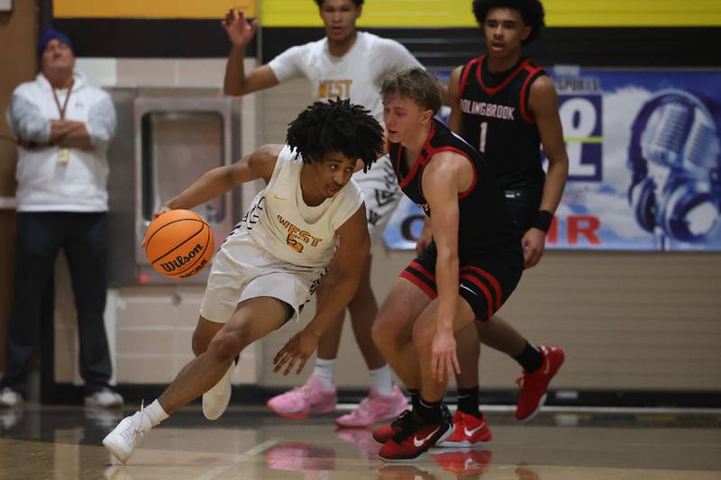 Joliet West’s Nasir Sears rolls out against Bolingbrook on Friday, Jan 24, 2025 in Joliet.