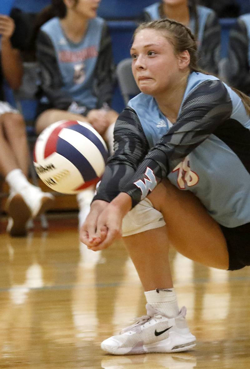 Marian Central's Ella Conlon passes the ball forward during a nonconference volleyball match against McHenry Monday, Aug. 28, 2023, at Marian Central Catholic High School.