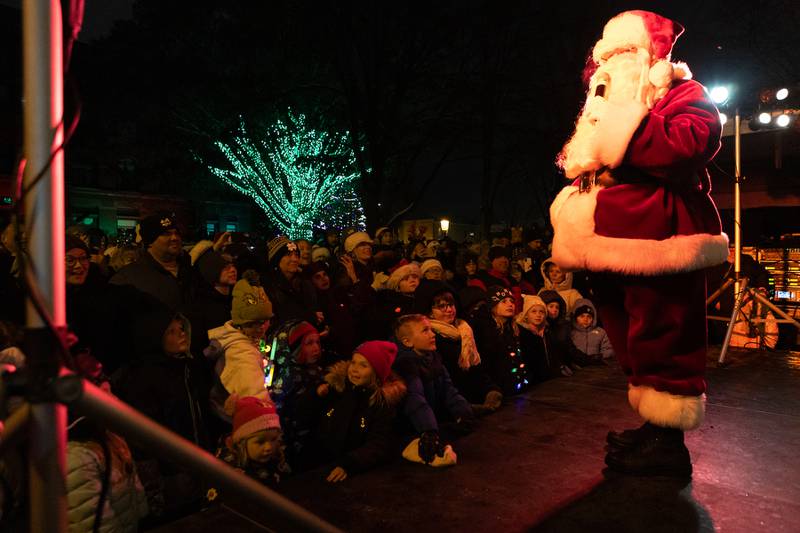 Santa talks to the crowd at the Annual Geneva Christmas Walk on Friday, Dec. 5, 2025 in Geneva.