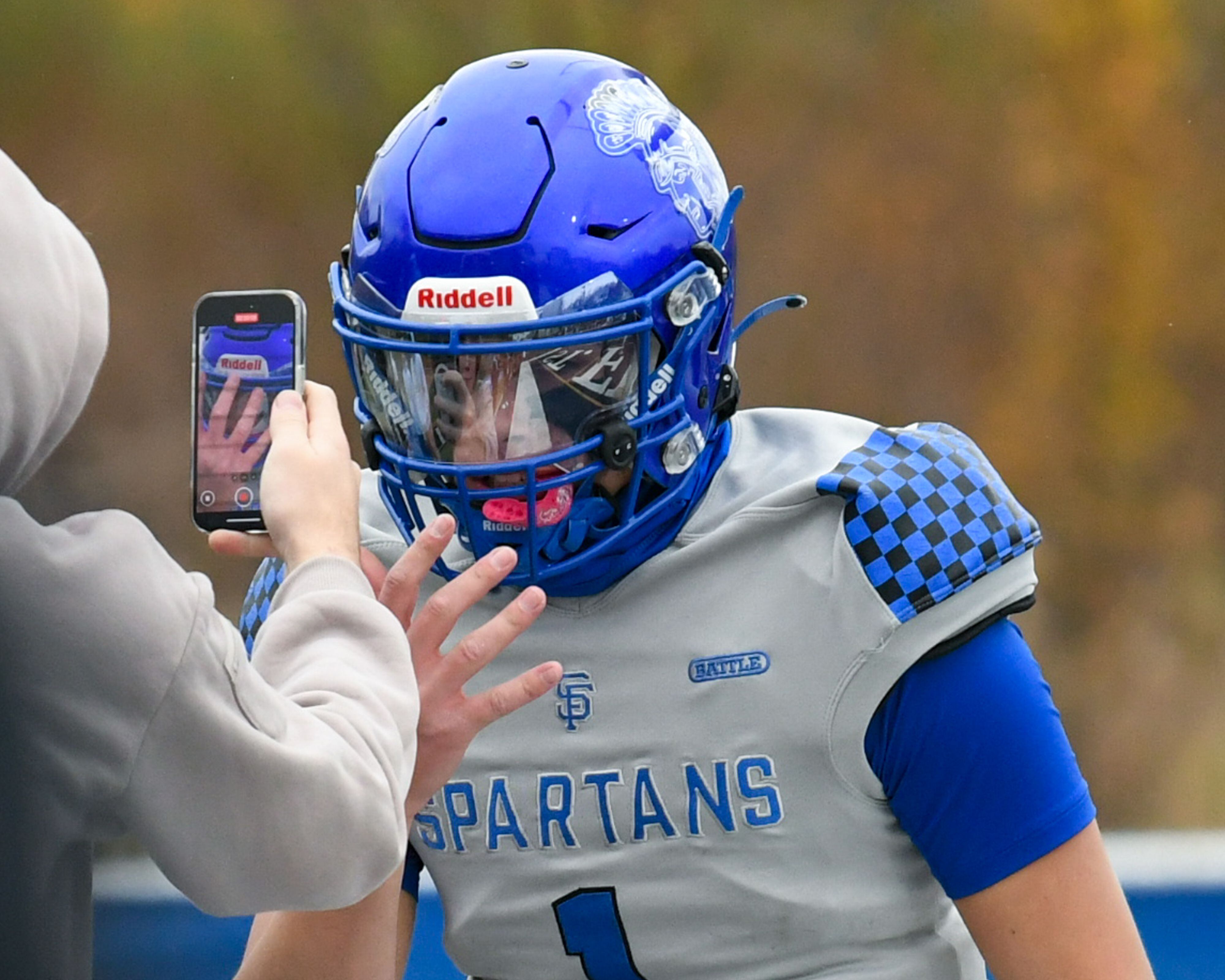 St. Francis's Brock Phillip (1) celebrates his touchdown on Saturday Nov. 8, 2025, during the second round of the 5A playoff game while taking on Prairie Ridge held at St. Francis's High School.