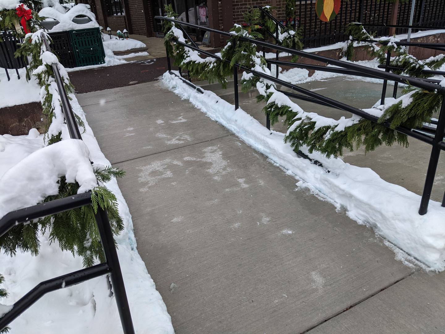 The new ADA ramp is located on Main Street in downtown Oswego.