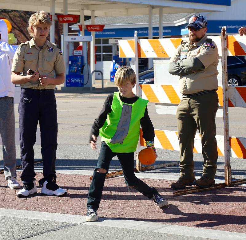 Felix Tieri Ton participates in the Boy Scout Troop 6’s Pumpkin Roll at Batavia Bat Fest on Saturday, Oct. 26, 2024.