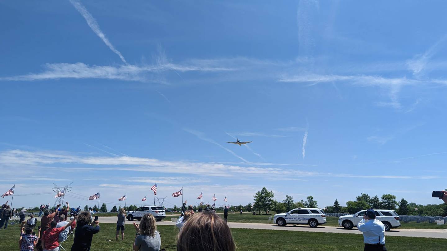 Pilot Tom Buck flew a World War II-era airplane above the audience with a 102-year-old World War II veteran serving as co-pilot during the 24th Annual Memorial Day Ceremony on Monday, May 29, 2023, at Abraham Lincoln National Ceremony in Elwood.