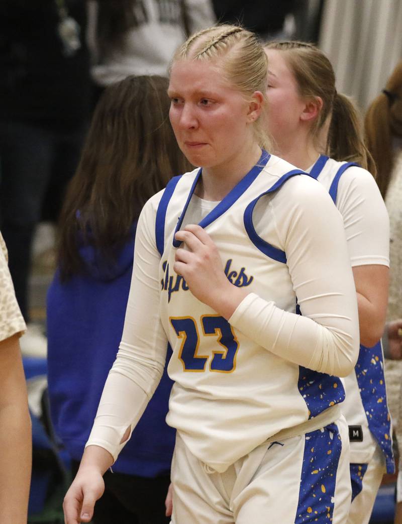 Johnsburg's Casie Majercik tries to contain her emotions after Johnsburg lost to St. Edward in the IHSA Class 2A Johnsburg Sectional girls basketball championship game on Thursday, February, 26, 2026, at Johnsburg High School.