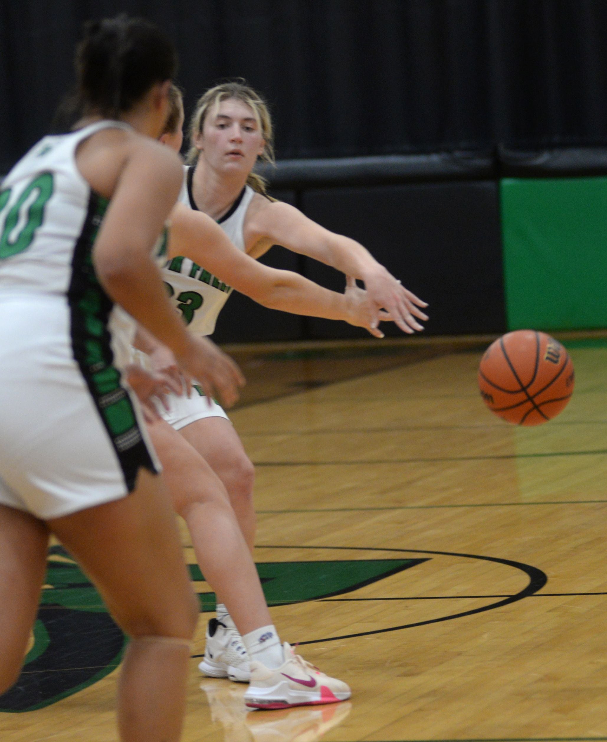 Rock Falls' Claire Bickett (23) tries to pass to a teammate during a Monday, Nov. 27, 2023 game with Rock Island-Alleman at Rock Falls High School.