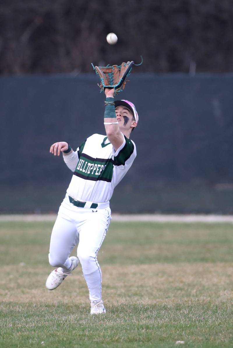Glenbard West’s Kristian Shinohara makes a catch in right field during a game against Batavia at Village Green Park in Glen Ellyn on Wednesday, March 13, 2024.