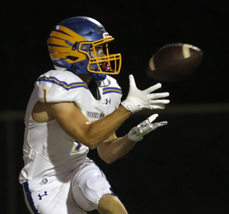 Johnsburg's Jake Metze catches a touchdown pass during a non-conference football game Friday, Sept. 2, 2022, between Marian Central and Johnsburg at Marian Central High School.