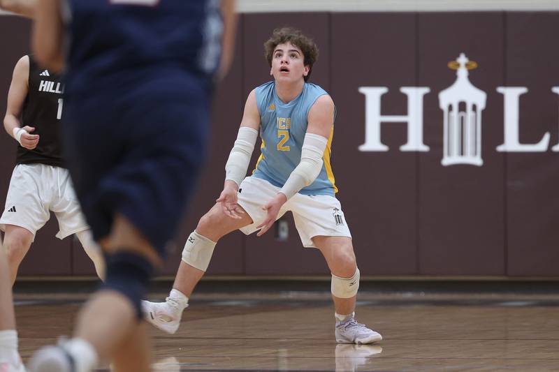Joliet Catholic’s Benjamin Alessio looks to receive the serve against St. Viator on Wednesday, April 24, 2024 in Joliet.