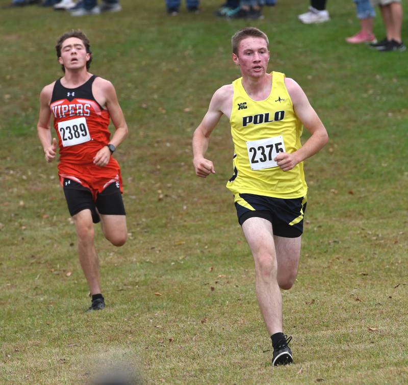 Polo Forreston's Levi Bocker sprints to the finish line at the Amboy Columbus Day Cross Country Invitational held at Shady Oaks Country Club near Amboy on Monday, Oct. 13, 2025.