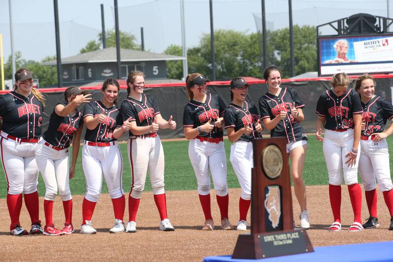 Members of the Benet Academy softball team strike a pose after winning the Class 3A State third place game over Charleston on Saturday, June 10, 2023 at the Louisville Slugger Sports Complex in Peoria.