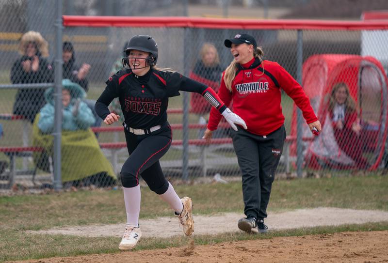 Yorkville's Madi Reeves (2) rounds third after homering against Neuqua Valley during a softball game at Yorkville High School on Wednesday, April 6, 2022.